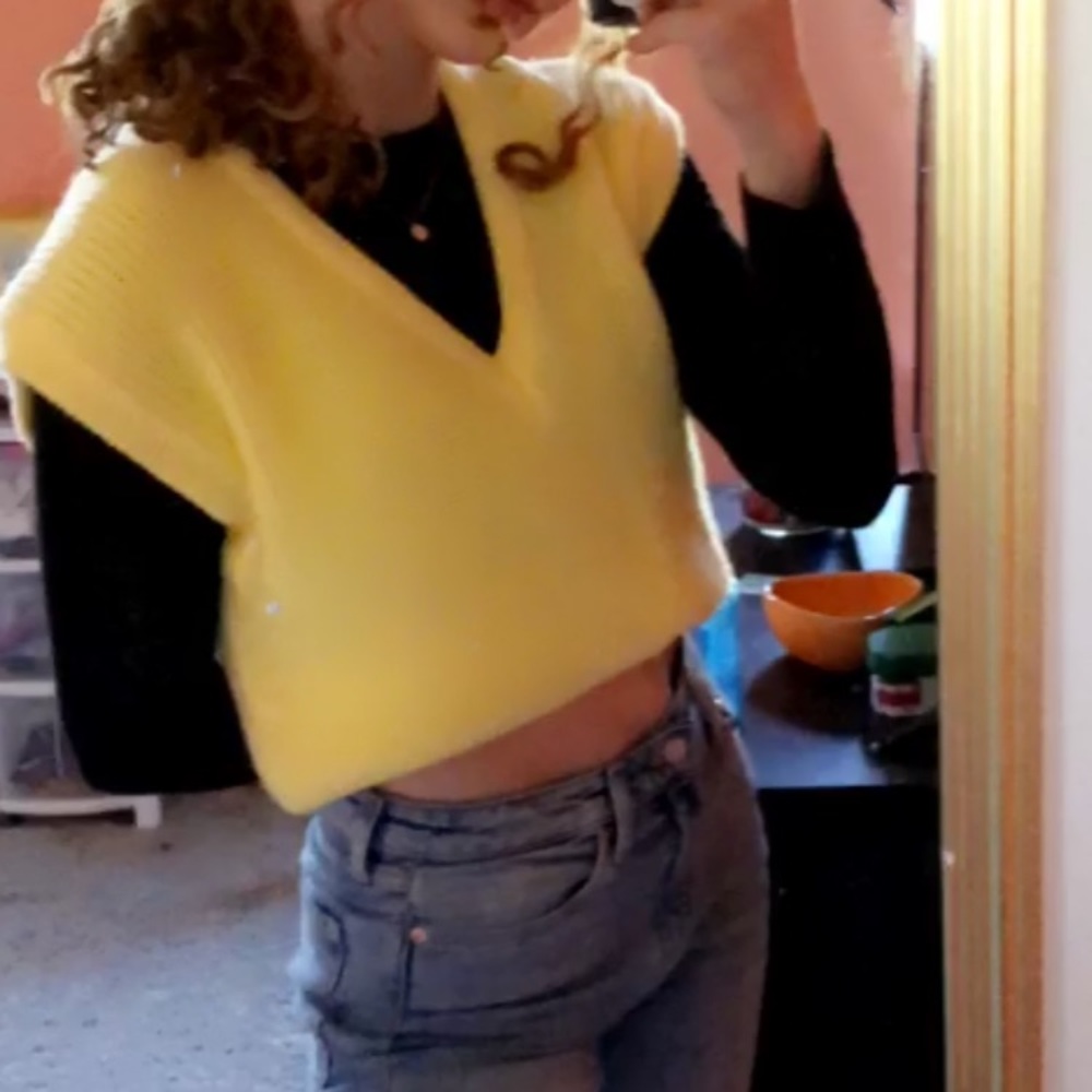 yellow sweater